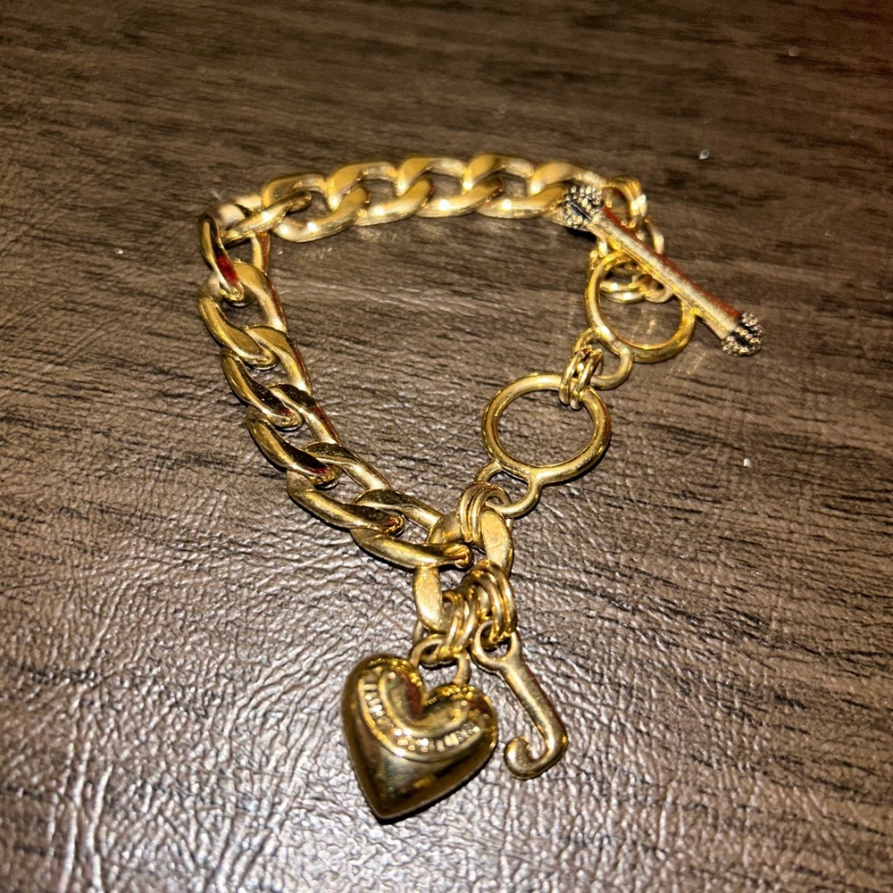 Brand new juicy couture charm bracelet
